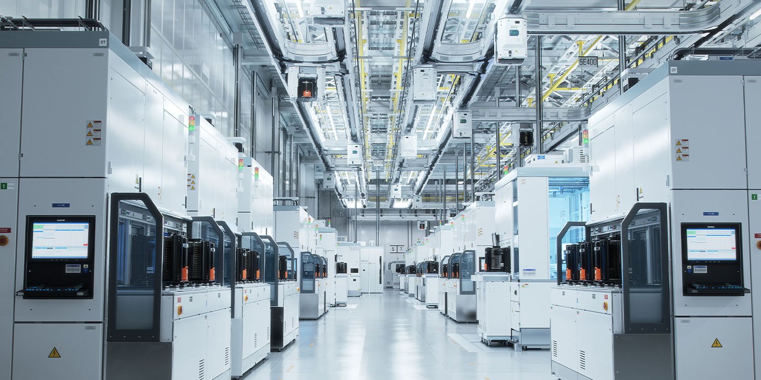 stock-photo-wide-shot-of-bright-advanced-semiconductor-production-fab-cleanroom-with-working-overhead-wafer-2250937375.jpg